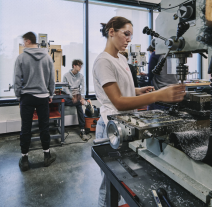 Students using woodworking machines
